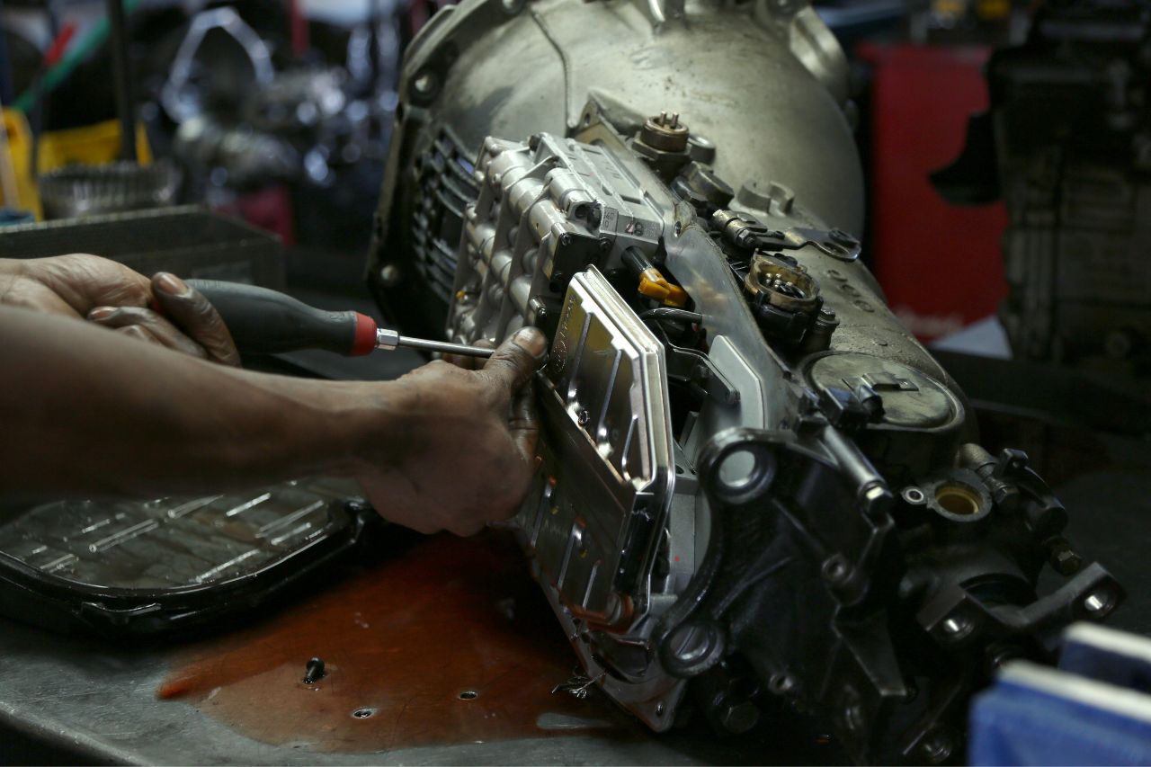 Transmission Repair Services working on Car